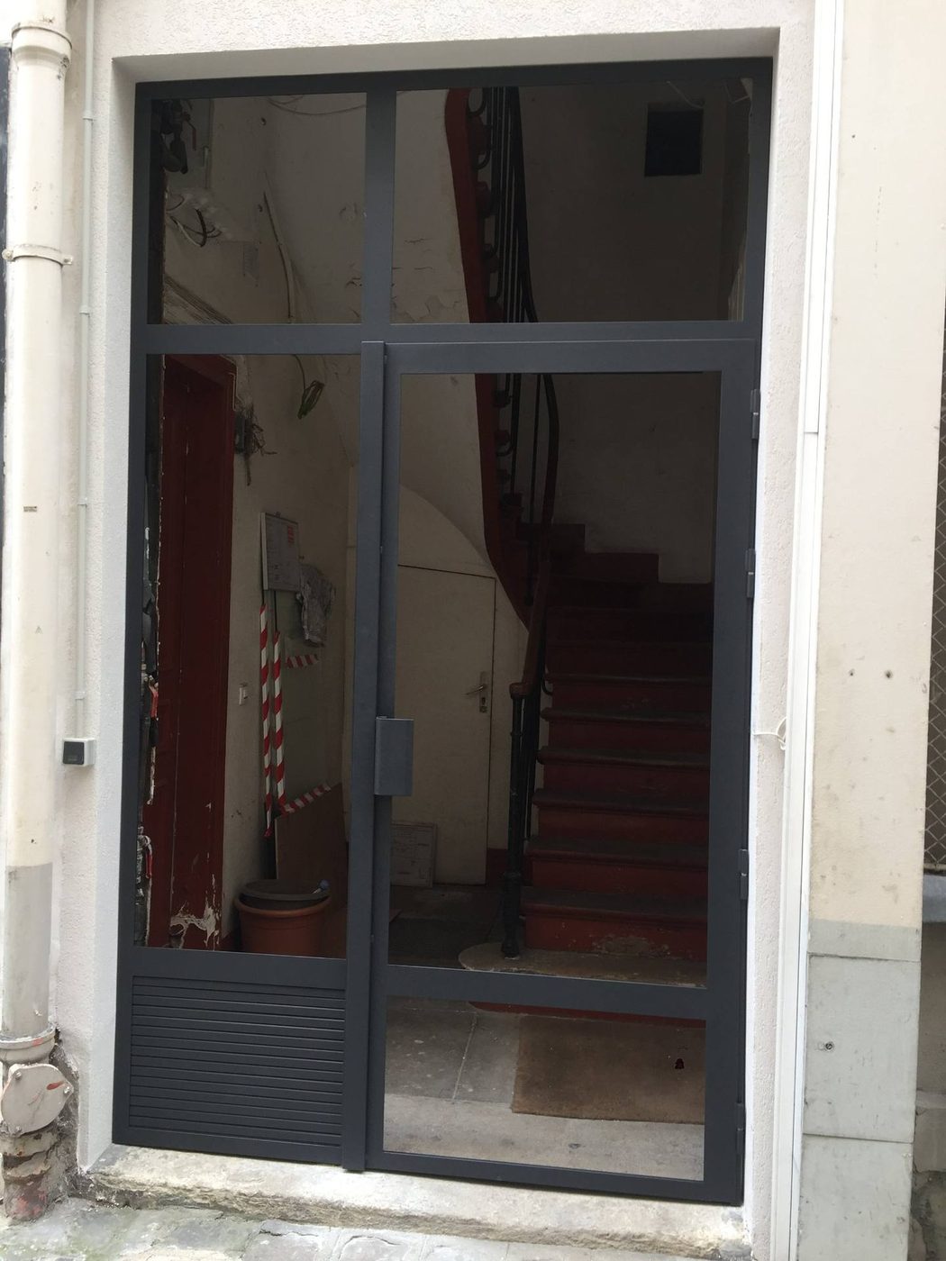 Porte d'entrée d'immeuble double vantail, vitrage clair — EloxyMetal