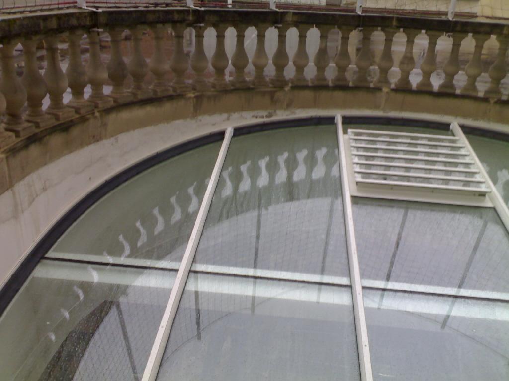 Verrière arcade verre feuilleté cour intérieure immeuble haussmannien